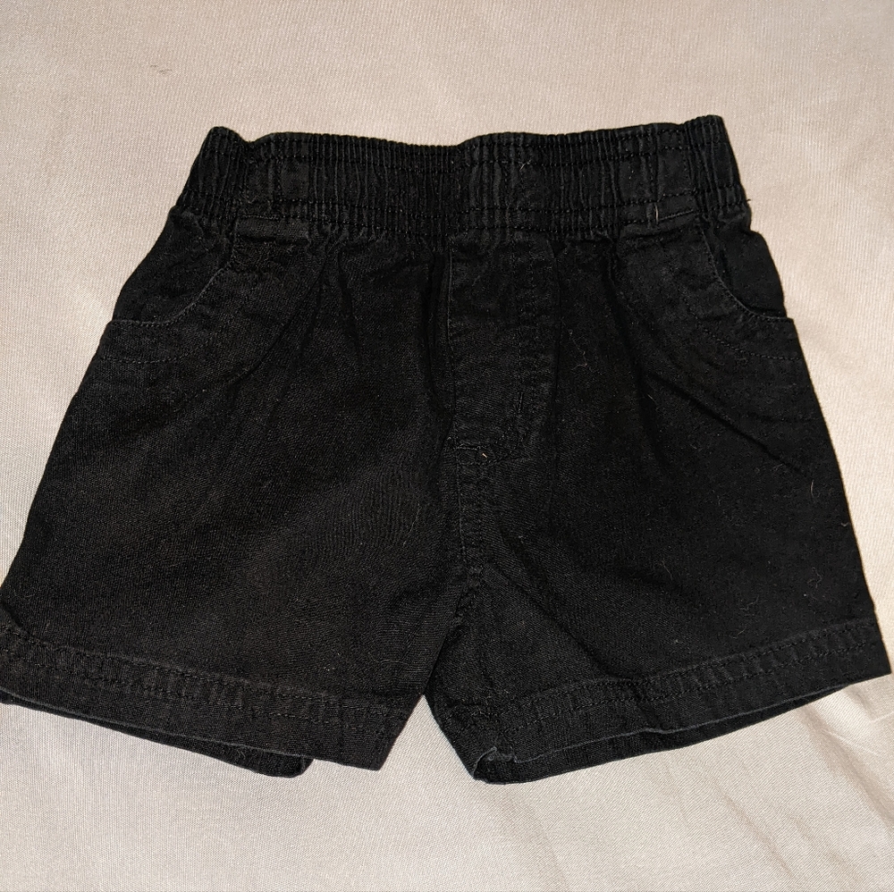 Garanimals 6 to 9 months old boys black shorts.